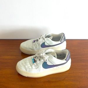 Nike Air Force 1 Sage Low in white with iridescent purple/green accent